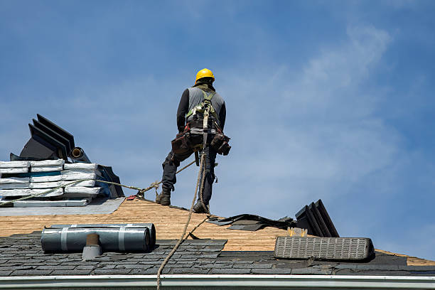 Professional Roof Replacement technician working in Thompson, CT